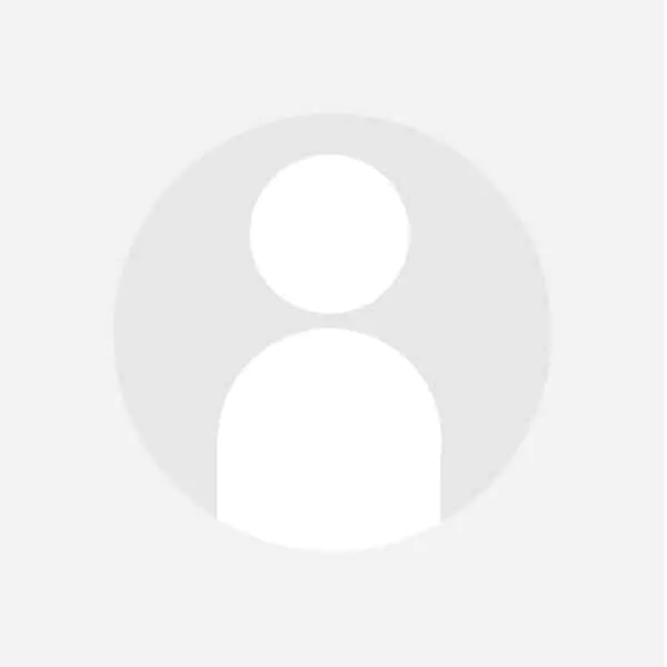 A white circle with a person's face in it.